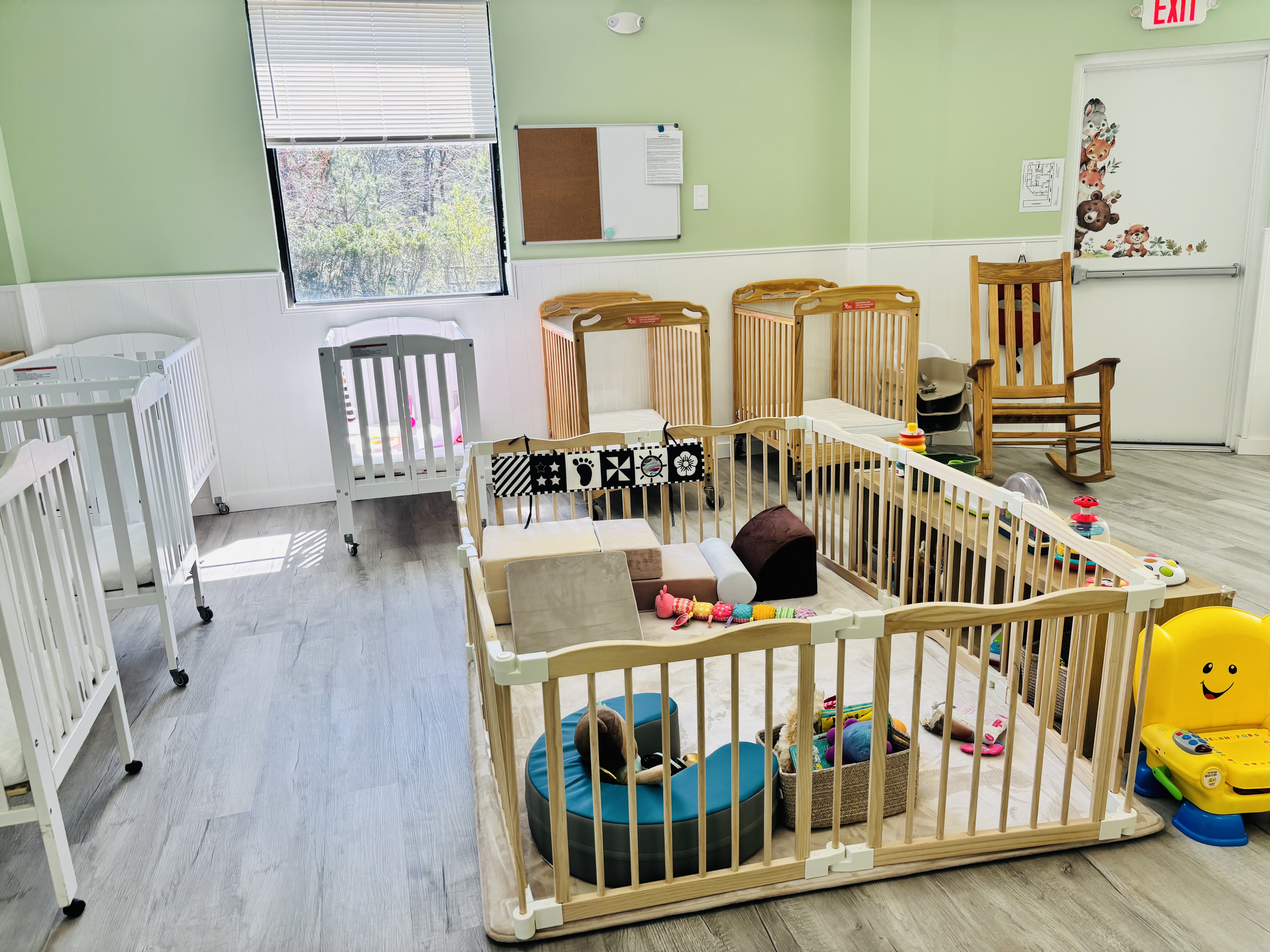 Infant room with play yard
